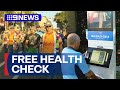 Queensland footy fans urged to use free health check | 9 News Australia