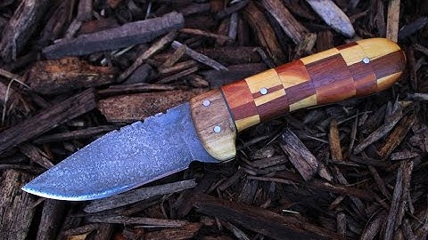 Making a drop point hunting knife from start to finish.