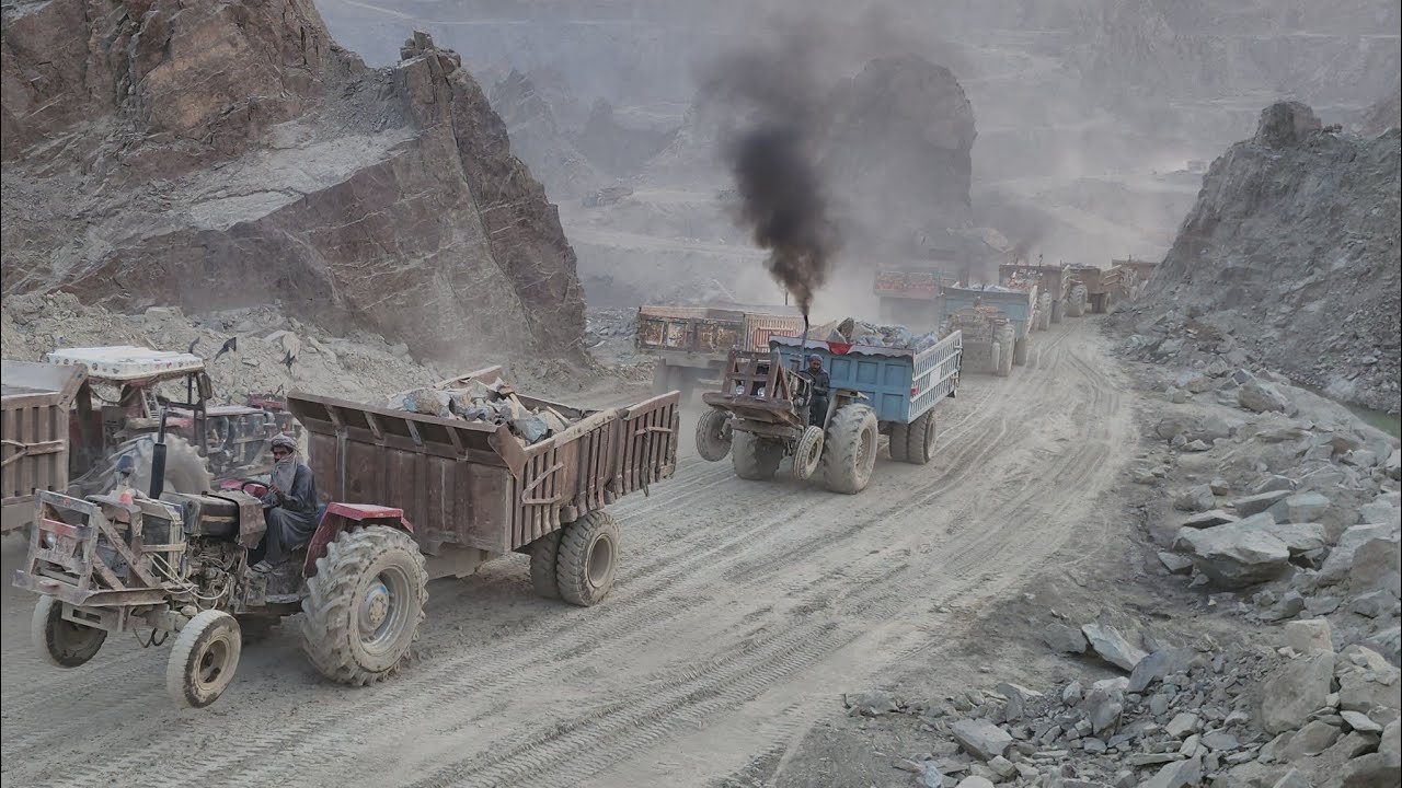 Traction Big Rocks Powerful Tractors Pulling Huge Trolleys | Giant Rocks Transported to ...