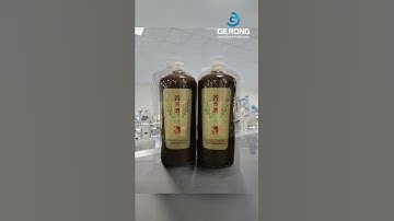 Semi automatic wine round bottle rolling lableing machine testing video