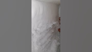 scraping freezer frost with a hand #shorts