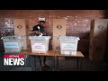 Vote counting underway in Zimbabwe election after delays, extensions and arrests