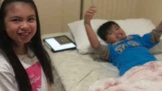 Giving my little brother a relaxing massage.