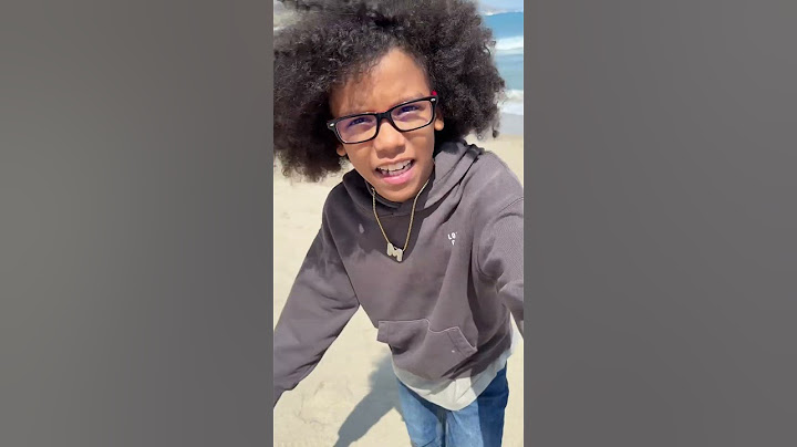 Mom tells son there is a shark behind him in the ocean and this happens… #shorts #family #chaos