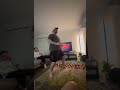 Alex does the worm then runs out the door