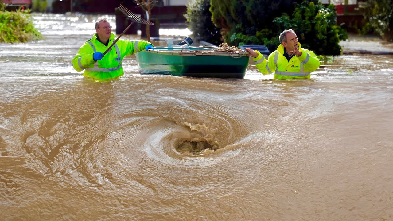Flood Fix Unclogging a Clogged Drain to Restore Street Drainage - YouTube