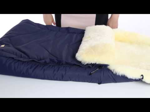 Детский меховой конверт TOSCANA торговой марки Mansita из натуральной овечьей шерсти Детский меховой конверт TOSCANA торговой марки Mansita из натуральной овечьей шерсти