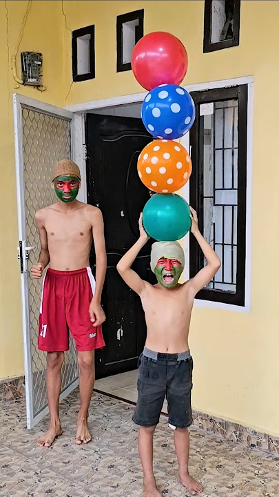 SCREAMING IN SURPRISE BECAUSE THE BALLOON EXPLODED