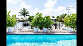 Luxe 4BR Waterfront w/Htd Pool, 5min to beach