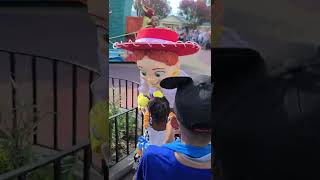 Toy Story Woody Greets Child At Walt Disney World Parade