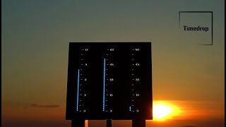 Time lapse of the clock Timedrop - 2 hours in one minute at sunset Timelapse Digital Clock After Sunset