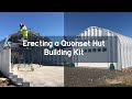 Erecting a quonset hut building kit