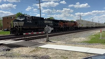 Conductor gives a wave!! Norfolk Southern intermodal eastbound Over River Rd in Naperville, IL!!