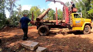 RUNNING A BIG STICK LOG TRUCK