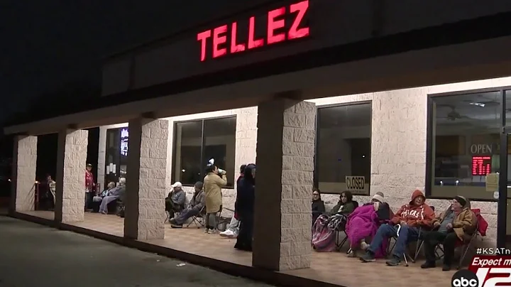 Patient customers arrive early, wait in long lines...