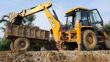 JCB Backhoe Machine Making Drain and Loading Soil in Tractor - JCB Working For Road Construction