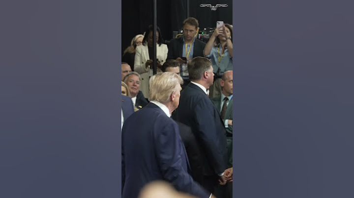 Chaos erupts when Trump makes surprise appearance in spin room