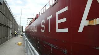 See 740-foot long freighter pass through Soo Locks