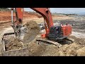 Hitachi Zaxis 670LCR Excavator Loading Mercedes And MAN Trucks - Operator Anogiatis
