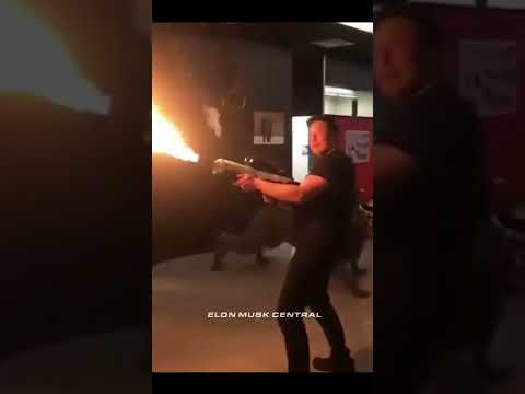 Elon Musk Using His Flamethrower!