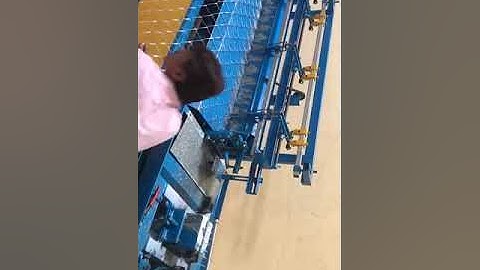 Fully automatic chain link fencing machine