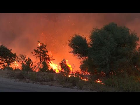 Wildfires rage in