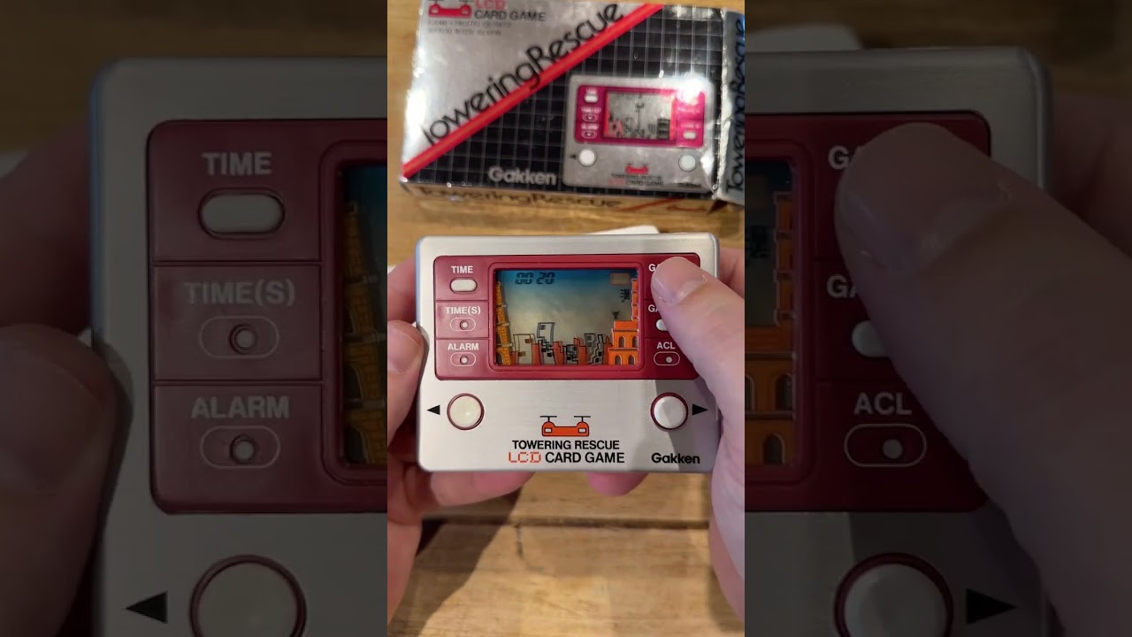MAC 77 - Gakken Towering Rescue 1981 LCD Metal Card Game Handheld Watch Travel Alarm Retro Fun! 🕹🎮🚁