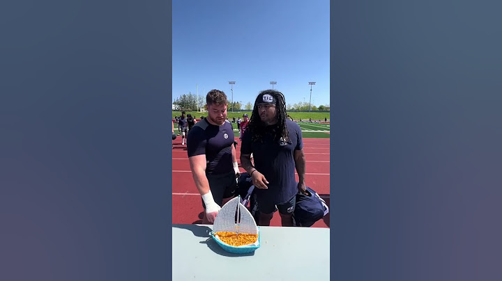 Players Try Hickory Sticks