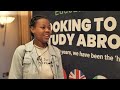 Marianna christophi talks with a student studying abroad  global education expo 2022