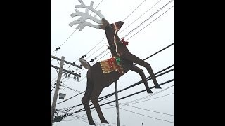 Christmas yard decorations made from wood. We installed motors to make the reindeer look like they are jumping off the ground.