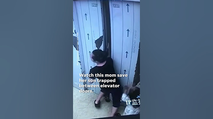 Heroic mother saves toddler stuck in elevator doors #Shorts