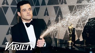 Rami Malek Sprays Champagne After Winning Oscar