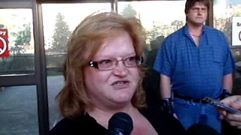 Heather Goncalves talks to press outside of law co...