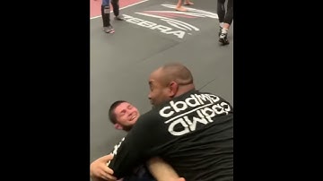 Khabib Nurmagomedov trying his hardest to submit Daniel Cormier