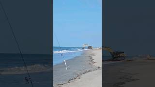 The LAST beach Dredging pipe floats into the ocean at Atlantic Beach