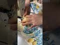 The process of sewing the edges of the blue printed silk scarf together💙💛