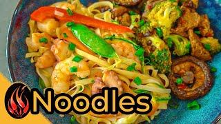 Comida china en casa 'noodles y res con brocoli'