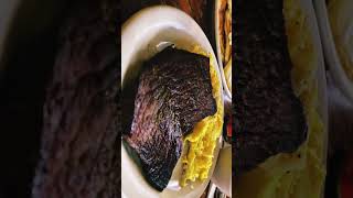Eating At Cracker Barrel.                   Steak 🥩 ￼& grits, and eggs 🍳￼