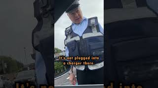 Parking ticket officer wrongfully giving a man a parking fine in a Tesla