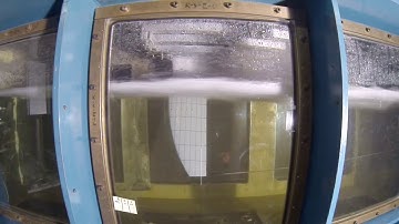 Disturbed free surface during measurements on a surface piercing hydrofoil in a cavitation tunnel