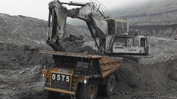 Big Digger Liebherr R9350 Excavator Loading Overburden On Komatsu HD785 & CAT 777 Dumpers