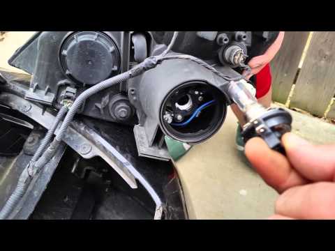 How to change a headlamp on a 2012 Kia Sodona $EASY