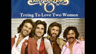 Watch Oak Ridge Boys Trying To Love Two Women video