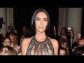 Kim Kardashian Ditches Makeup and Pants During Paris Fashion Week -- See...