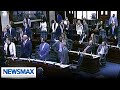 WATCH: Florida Democrats scream as DeSantis ends race-based districts | John Bachman Now