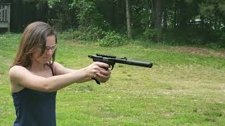 Courtney Trying Out The Ruger 2245 Lite And Liberty Suppressors Vector.