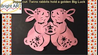 Bright Art : Paper cut: Twins rabbits hold a golden Big Luck