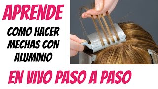Cómo hacer reflejos claros y oscuros con papel aluminio para el cabello