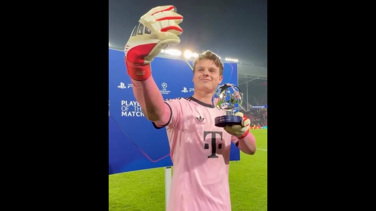 Jonas Urbig receiving the Man Of The Match award after the game | PSV 1-2 Bayern | Champions League