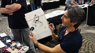 Iconic Comic Book Artist Drawing For Fans at OAX 2024